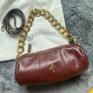 Manu Atelier Mini cylinder bag in reddish brown